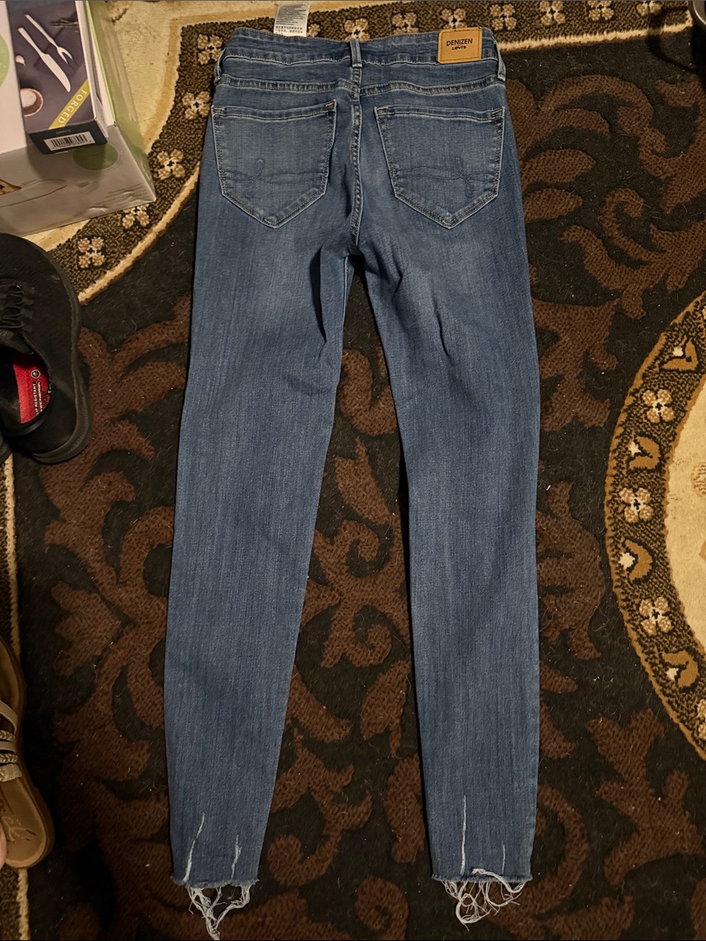 Denizen from Levi's Women's Medium Blue Skinny Jeans with Frayed Hem